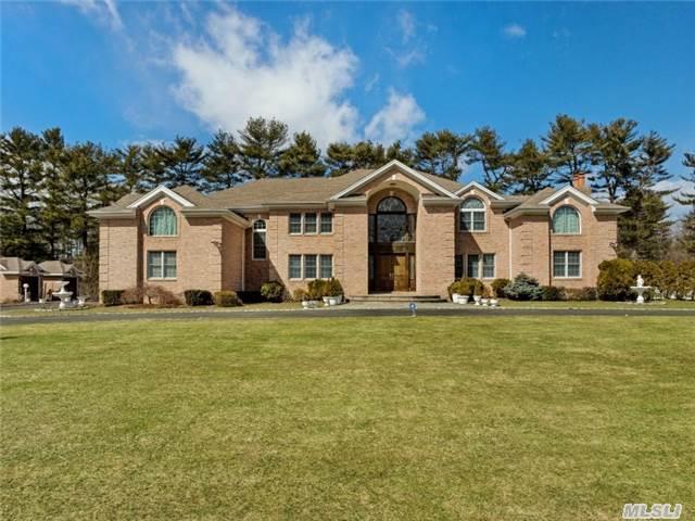 Gated Majestic Custom Blt Brk Col. Sited On Priv.2.1 Flat Landscped Acres.Over 6000Sqft Of Elegance & Charm, Lrg Prcpl Rms Inc.Handsome Lib W. Cstm Mill Work, Gst Qrtrs W. Priv.Bth.Chefs Custom Eik W. Stunning Granite Countertops+Access To Glorious Light Flooded Sun Rm.Ovrszd Mstr Retreat W. Sit Rm+Fpl.*Whole House Generator* Estate Fencing, 3 Car Gar. Jericho Sd