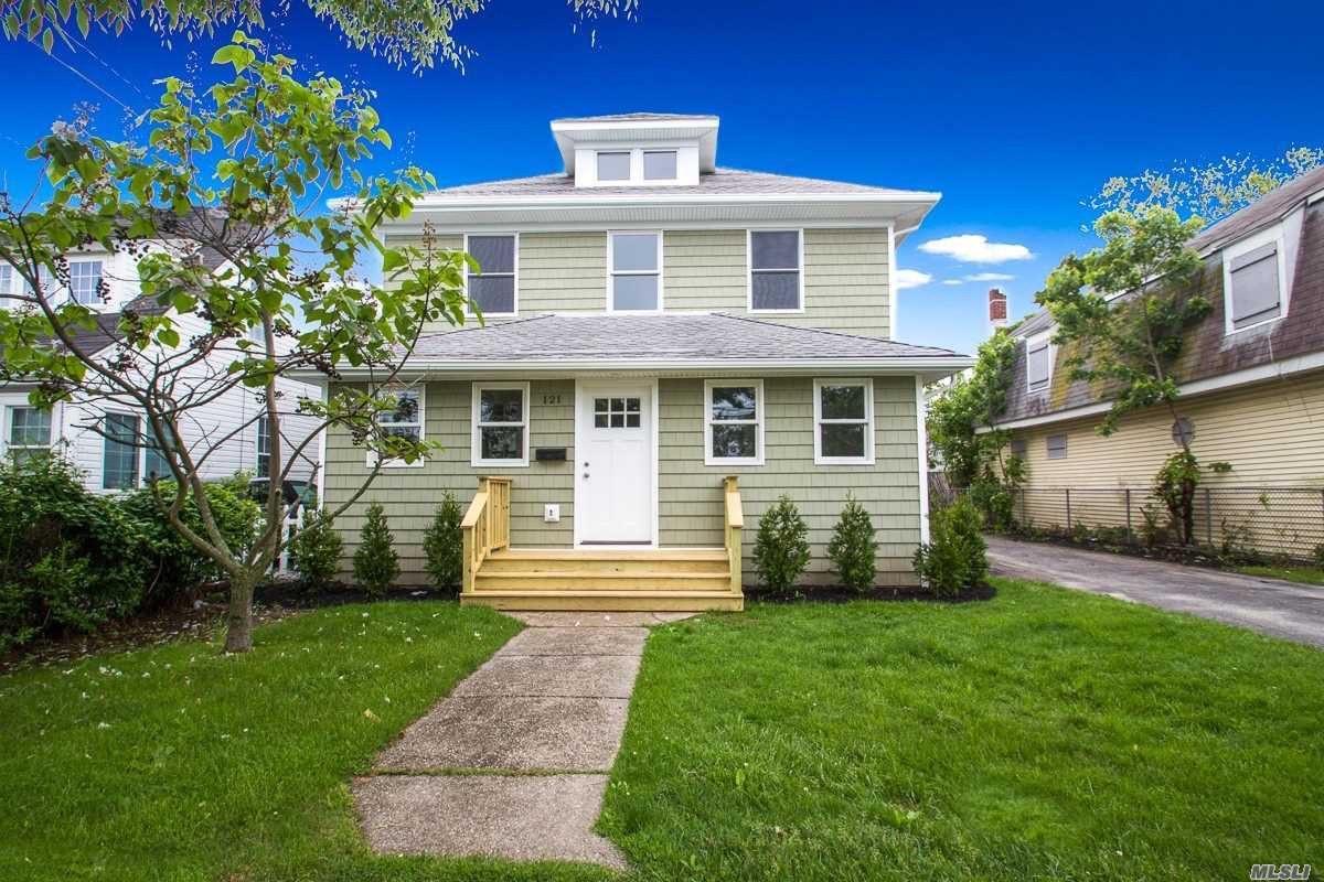 Gorgeous Newly Renovated Colonial Featuring 4 Large Bedrooms, 2 Full Bath, Relaxing Front Porch, Wood Floors, Crown Moldings, New Windows, Gas Heat, Garage With Loft. Must See!!