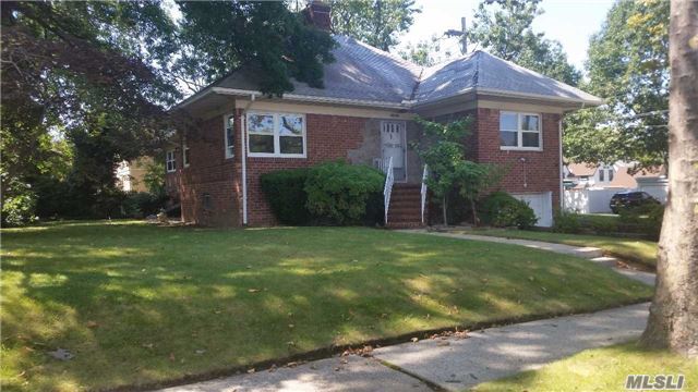 Lovely, Large, Brick/Stone Corner Property. This Is A Unique Custom Built Home. Just Painted, Just Sanded Gorgeous Oak Hardwood Floors, Cac On All Three Floors, Stone Fireplace,  Large Bedrooms With Double Closets,  Huge Finished Basement With Very High Ceilings. Bonus Storage Rooms. Two Car Garage (Tandem}. Convenient To Bayside Lirr, Bell Blvd, Highways.