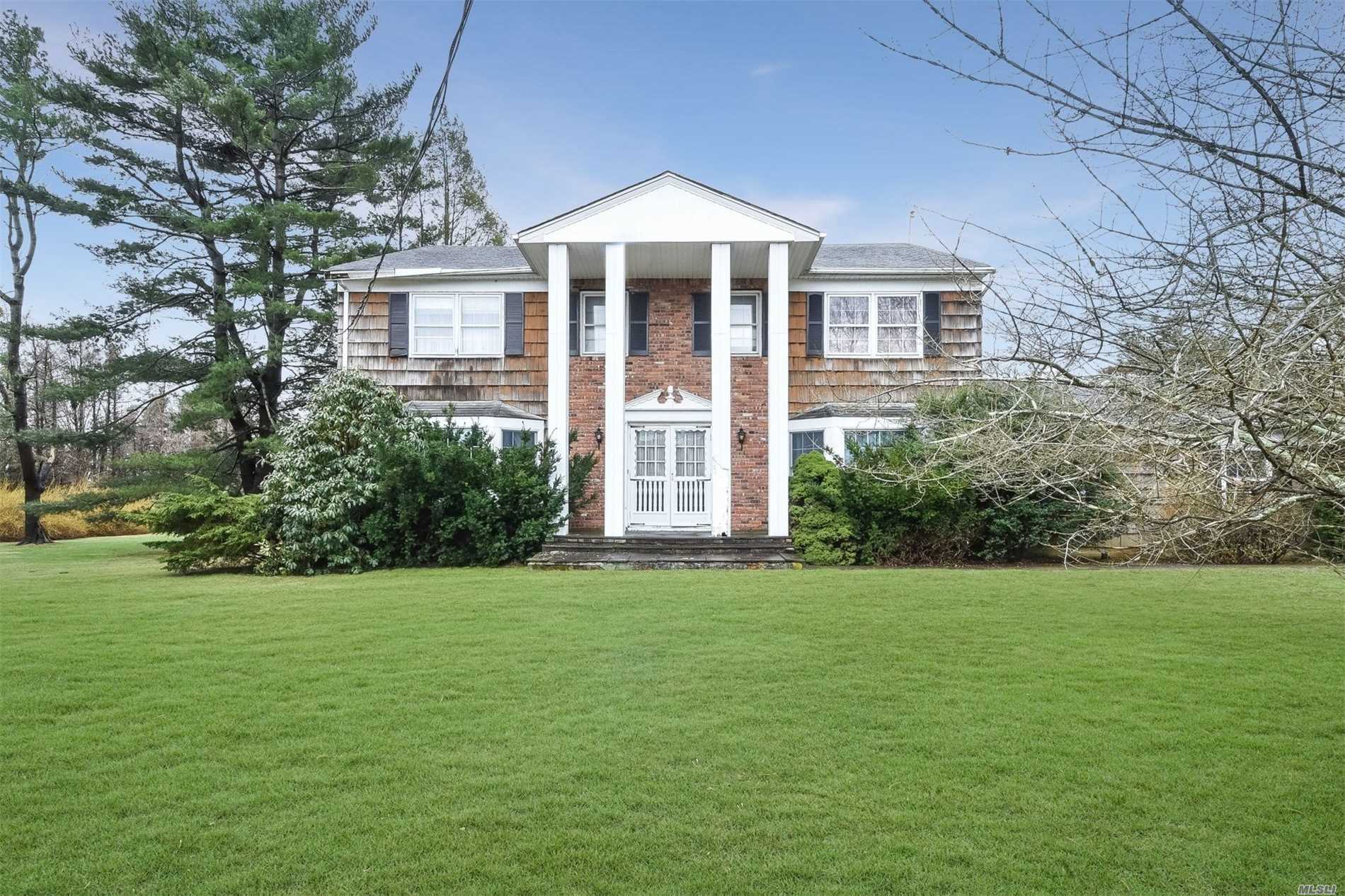 Location, Location, Location. Stately Center Hall Colonial In Desirable Jericho School District. This 5 Bedroom, 3.5 Bath Home Rests On 2+ Beautiful, Flat Acres With A Pool. Tucked Away On A Quiet Cul-De-Sac And Yours To Design. Must See.