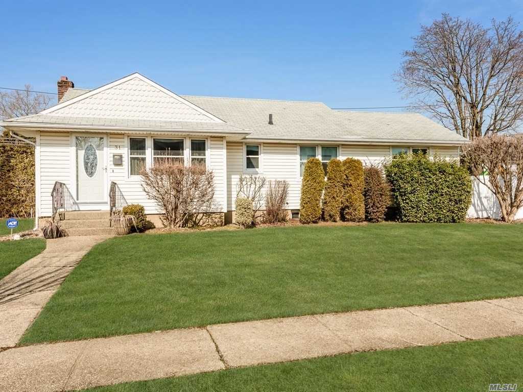 Bright Expanded Ranch In Syosset School District. Boasting 3 Bedrooms,  Updated Full Bath, Den Or 4th Bedroom.  Enjoy Entertaining Your Friends In The Additional Family Room With Custom Built Bar. This Lovely Home Is Situated On A Beautiful Corner Property Fully Fenced For Your Privacy. Minutes From Restaurants And Shops.