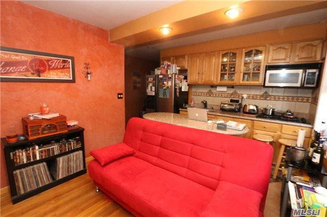 Fully Renovated Studio Converted Into A 1 Bedroom With Plenty Of Windows Throughout. Granite Countertops , Wooden Cabinets, Tiled Floors. Also Features Hardwood Floors Throughout The Apartment. Close To E, F Trains, Q44& Q60 Buses. Manhattan Express Bus.