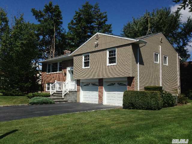 Totally And Completely Re-Done,  Spacious Home On Oversized Park-Like Property In Prestigious East Birchwood Section Of Jericho With Famed Syosset Schools!   4 Large Brs(Incl Mstr Suite) 2.5 New Bathrooms,  Gorgeous New Granite Eik W/Ss Appls & Sliders To Yard,  New Hw Floors,  New Windows,  New Siding,  2-Car Garage And Driveway,  Gas Heating/Cooking,  Igs,  Cac & More!