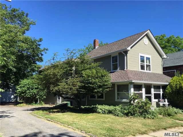 Large Family Home W/4 Bedrooms, 3 Baths In The Heart Of Greenport. Home Has Enclosed Front Porch, 4-Season Sun Room In Back, Large Work Space. Working Fireplace. Property Is Fenced In & Private With A 4-Car Garage.