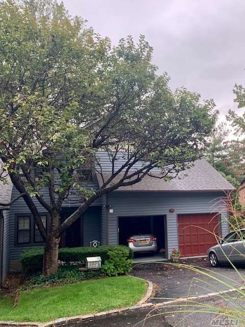 Sale may be subject to term & conditions of an offering plan. Beautifully maintained split level end unit Town home featuring large bedrooms, harwood floors, vaulted ceilings, updated bathrooms, 2 car att garage, pvt. rear deck. Located in beautiful Landmark community. Walk to shopping and dining. Please verify all info.