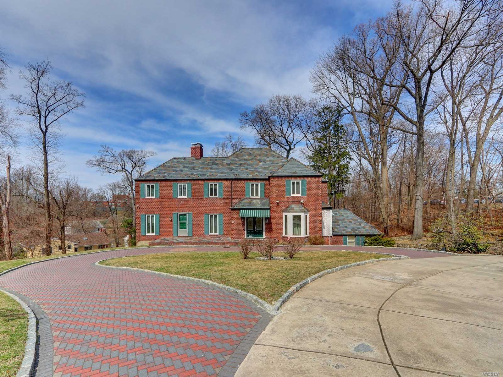 Stately All Brick Classic-Style Center Hall Colonial On 0.5 Acre Property In Prestigious Area Of Strathmore, New Pavers Circular Driveway & Elegant Courtyard Setting Entrance, The Glamour Of Old World Charm With Generous size Rooms, Many Fireplaces & Stunning Views Of Private Land, Many Updates Including New Slate Roof & New Central Air, Hardwood Floors Throughout, Near Houses Of Worship, Easy Access To Northern Blvd.In Great Neck Park District With Pool, Tennis Courts, Ice-Skating & Waterfront Parks.