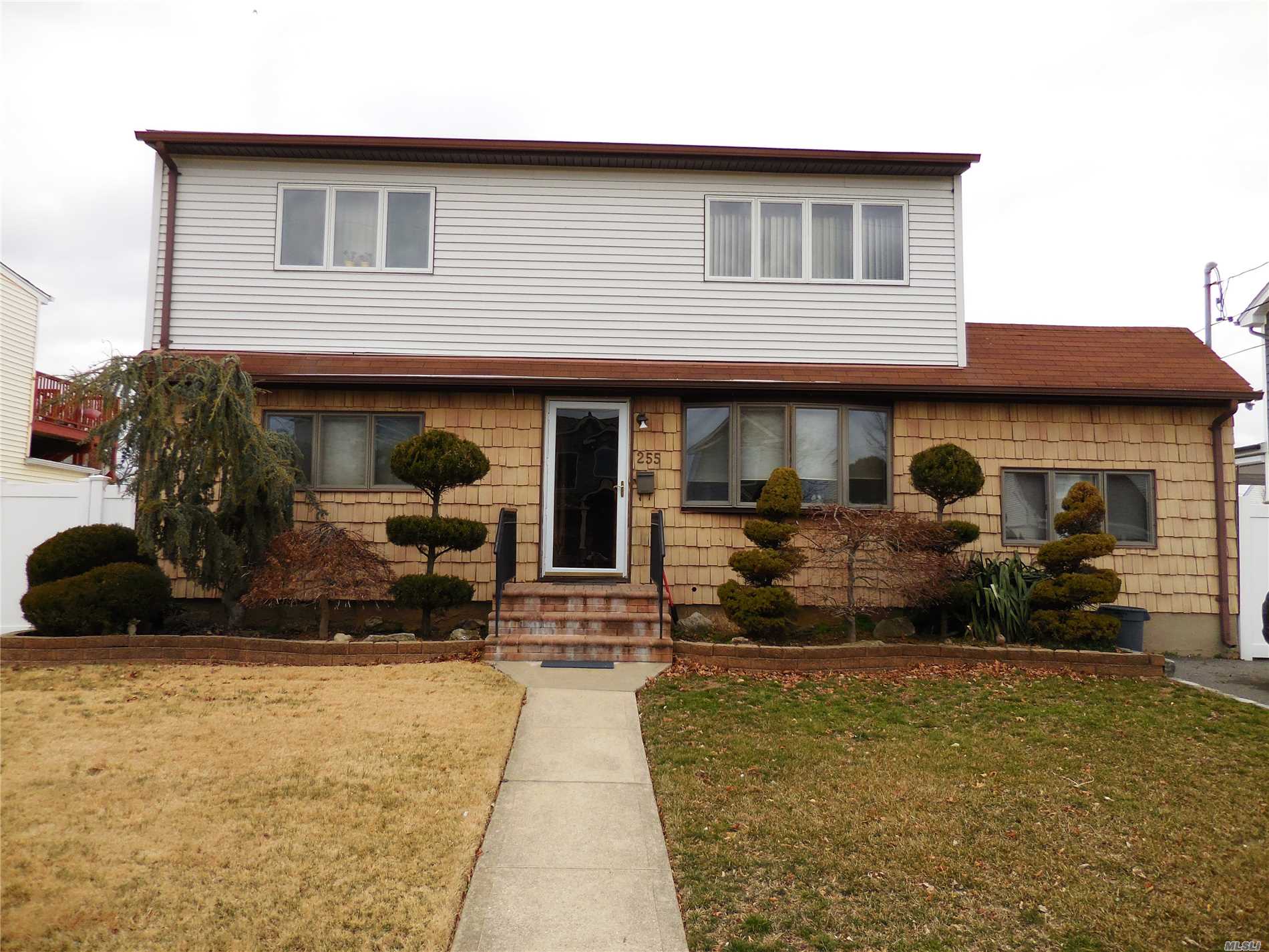 Mother Daughter With Proper Permits. Large Double Dormered Cape In Plainedge School District.  Gas Line Inside Of Home. Full Finished Basement With Outside Entrance. Updated Kitchens And Bathrooms. Entertainers Yard.