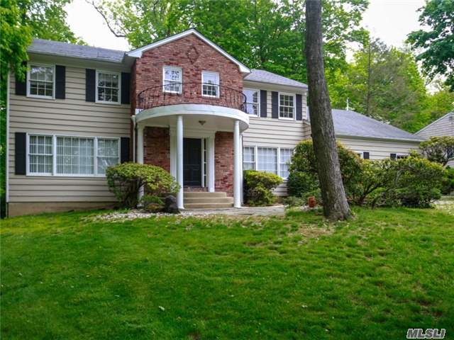 Move Into This Majestic Center Hall Colonial In Roslyn Estates. Warm And Inviting, Sun Filled 5 Bedroom, 3.5 Bath Home With Great Layout For Entertaining. Eat In Kitchen, Den W/Fpl, Gracious Formal Living Room, Formal Dining Room. On .34 Acres Of Beautiful, Private, Lush Property. A Special Home In Roslyn Estates.