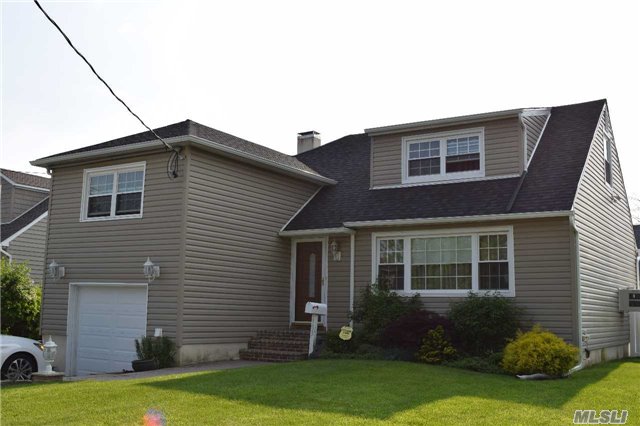 Birch Shaker Cabinets With Granite, Granite Kitchen, Rear Yard Paver Patio, Solid Hardwood Doors, Replaced Windows Throughout