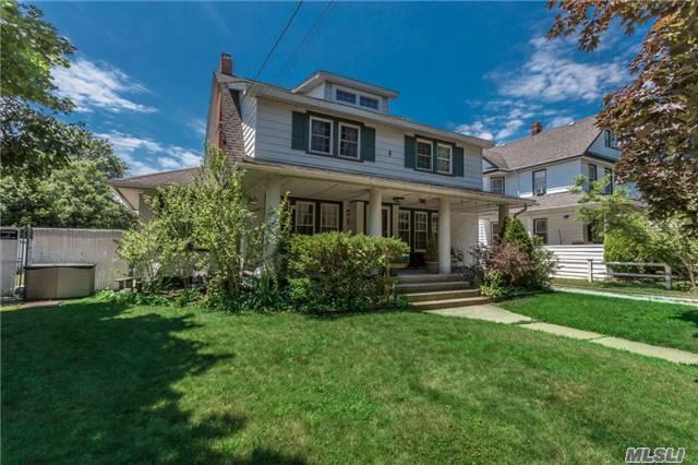 Super Lynbrook Front Porch Colonial! 3/4 Bedrooms, 2 Full Baths, Wood Floors, Detached 2 Car Garage! All Windows Replaced, 200 Amp Electric, Roof Replaced, Plumbing New, Central Vacuum, Updated Bath And Kitchen! Finished Basement!
