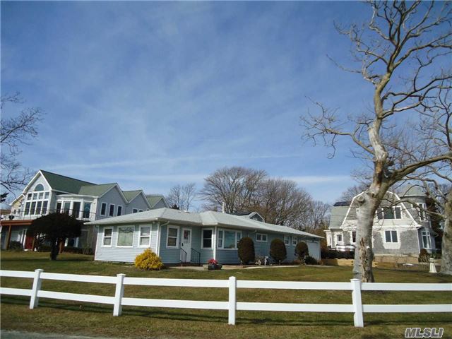 Wonderful Light Filled 3 Bedroom, 2 Bathroom Ranch With Water Views Of Corey Creek, Moyle Cove, And The Peconic Bay. Included In The Sale Is 2340 Minnehaha Blvd., A Waterfront .20 Acre Lot (W/ Bulkhead & Dock), Across The Street. True Taxes For Both Properties: $8079.88 W/O Star. Both Properties Are Part Of Laughing Water Property Owners Assoc..$185.00 Fee/Year. Fantastic!