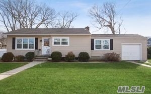 Opportunity Is Knocking With This Expanded Ranch Located On An Over Sized 100X100 Lot, Located In Massapequa School District # 23. This Home Features An Open Layout With Hardwood Floors Throughout , Updated Roof, A Full Basement And A 1.5 Attached Garage With Lovely Curb Appeal . This Is A Keeper.