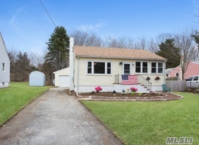 Beautiful Little Home With Water Views. This Home Offers An Updated Kitchen And Bath, Hardwood Flooring, Stainless Appliances, And Fresh Paint. The Homes Location Is Across From Water Front Homes And Offers Some Tranquil Water Views. The Property Includes A Back Yard Deck, Detached Garage And A Nice Yard. There Is A Boat Ramp At The End Of The Street.