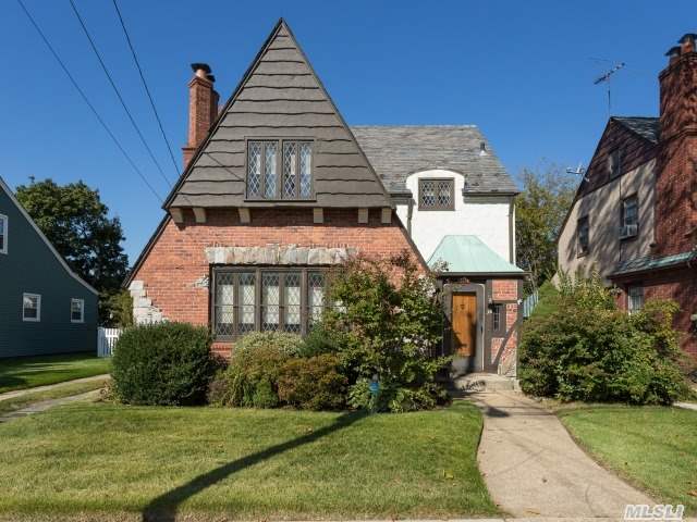 Introducing Brick Tudor Colonial Located In The Desirable Incorporated Village Of Floral Park With Floral Park-Bellerose Sd #22. Elegant Foyer Oversized Lr With Fireplace,  Fdr,  Eik Plus Enclosed Porch. House Offers 1, 680 Sq Ft Plus Full Partially Finished Basement With Media/Play Room And Enclosed Porch Offering Additional Space. Basic Star Of $1, 037.85 Not Reflected.