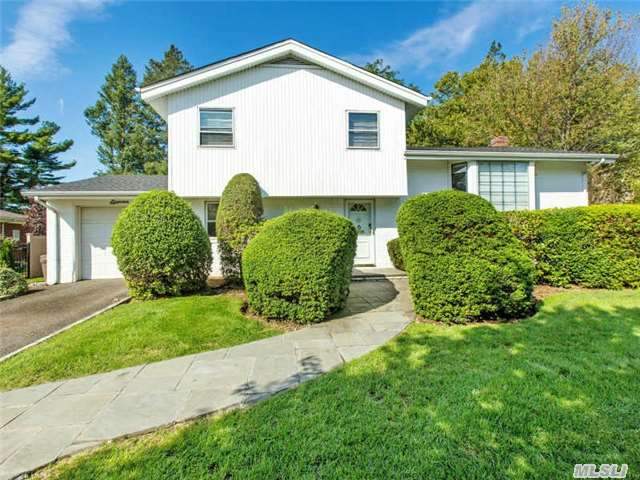 Lovely, Sunny & Bright Split Located On A Perfect Mid-Block Quiet Location... Home Features 4 Bedrooms And 2.5 Baths. Cathedral Lr Ceiling... Hardwood Floors Thru-Out...Newer Roof, Heating & Cac... Igs....Gas Cooking....Beautiful Backyard Property......Prestigious Jericho Schools......Cantiague Elementary...