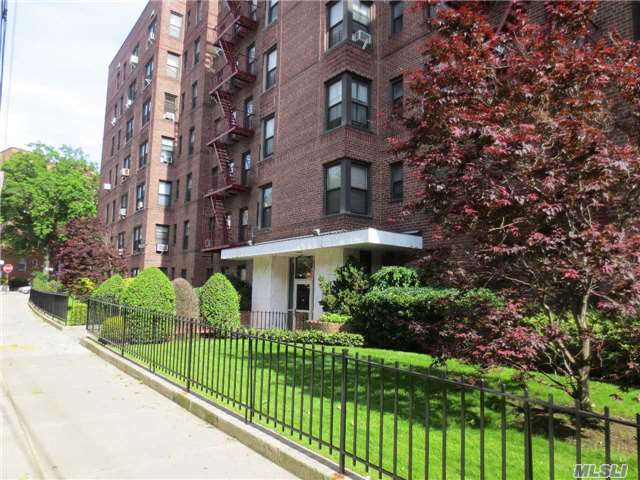 Newly Renovated, Spacious, Sunny, Corner 2 Bedrooms,  Large Living/Dining Room, Eat In Kitchen, New Refrigerator, New Kitchen Range, Full Bath, Hardwood Floor, 2 Blocks To E/F Trains, Q20, $44, Q60, Q25, Q34, Qm Buses Nearby. Private Garden, Camera Surveillance System In The Building. Garage Parking & Storage On The Waiting List. Move In Condition. Convenient To All.