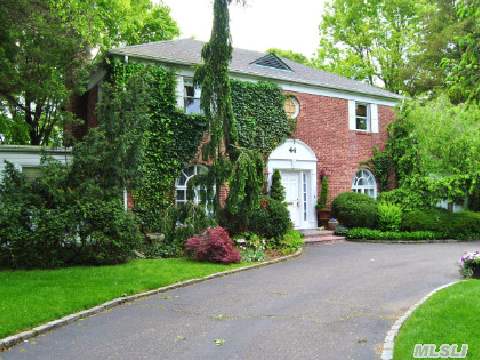 Circular Driveway Leads To This Gorgeous Brick Colonial W/Park-Like Backyard In Mint Condition. Spacious Entertainment,  Living Room W/Frplce,  Family Room W/Frplce,  Library,  Full Bth,  Large Eat-In Kitchen W/Access To The Large Patio. 2nd Floor Features 3 Br's,  2 Bths & A Laundry Room. Finished Basement W/Entertainment Center & Laundry. Close To Town,  Transportation & Parks!