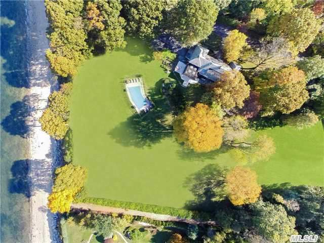 Spectacular 3.38 Acre Waterfront Property, Special Setting With French Normandy Style,  13 Room Multi Level Ranch,  Ig Pool Overlooking 180 Degree Water View,  400 Ft Beachfront,  Lovingly Maintained W/Perennial Flower Bed.Top Schools, Library,  Automatic Membership Offered W/This Sands Point Address, 36 Minute Direct Lirr Station To Penn Station, 30 Minutes From Airports.