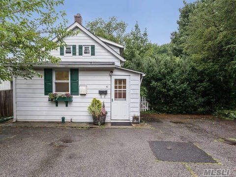 Renovated And Charming Cottage In A Quiet And Desirable Neighborhood On Picturesque Lot. New Eat In Kitchen With Quartz Counter-Top And Stainless Steel Appliances, New Bath, New Heating System, Hot Water Heater, Hardwood Floors And Built-Ins Throughout. Potential For Expansion.