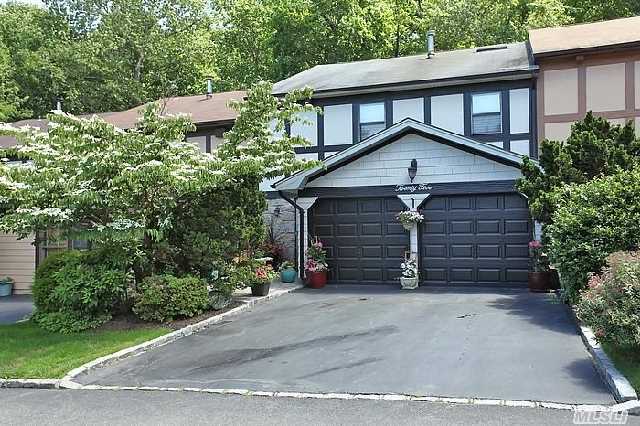 Perfect Location In Development With Private Patio Surrounded By Lush Greenery. Stone Fireplace,  Floored Attic,  Updated Bathrooms And New Tile Floor.