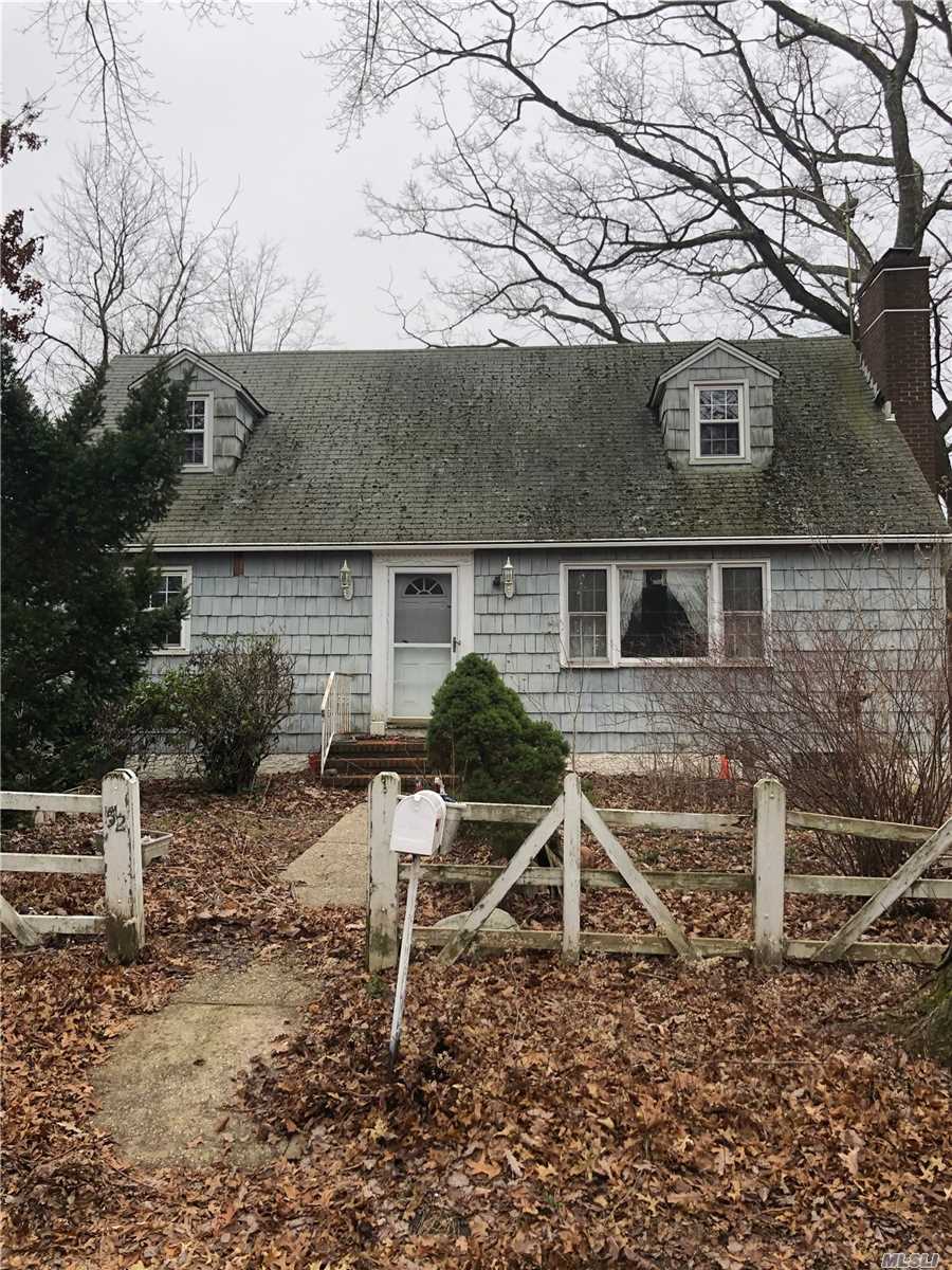 Cape style home Located just off of Jericho TPKE. 200 Amp Electric Service. Steel Beam Support. Dead End Street. Great Opportunity to Renovate or Build Up!