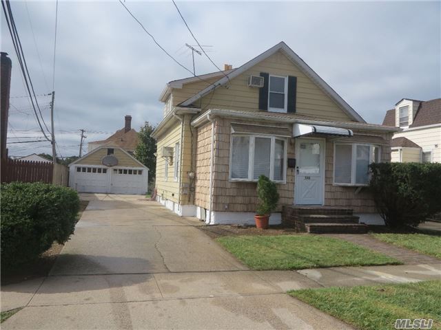 Great Potential For First Time Home Buyer. Freshly Painted New Hardwood Floors Throughout The House. 2 Car Garage, 4 Brs, Half Block From Busses. A Cozy And Warm Inviting Home. Close To High School. Shopping, Highway, Only A Mile From Hofstra University, Must See!!