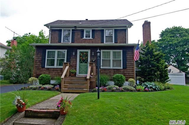 One Of 'Original Brightwaters Colonial' Home. Brings Character Of 'Old Brightwaters Charm' To The Residence,  Newly Built 1.5 Car Detached Garage,  Hardwood Floors Thruout, Crown & Base Molding Trim, Private Office & Sun Porch W/Frplc And A Meticulously Maintained Backyard. New Roof. A Beautiful, Charming, 3 Bedroom, Classic Brightwater's Home With Excellent Character!