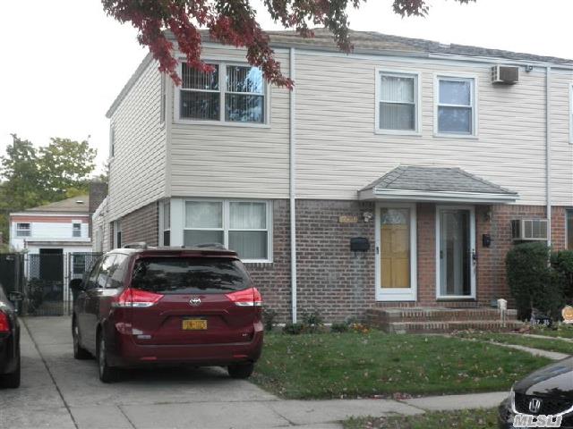 Lovely Semi Detached Colonial On A Great Block! Modern New Kitchen W/ Granite Counter Tops! New Central Ac , New Roof & New Siding. Best School District #26 ,  Ps46,  Is74 & Cardozo High School ! Convenient To Transportation And Shopping!