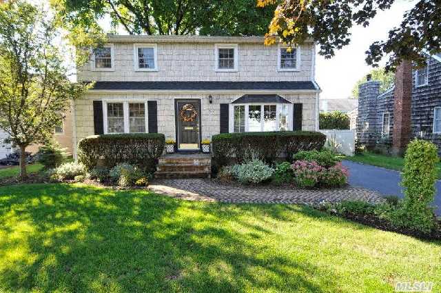 Lovely Colonial Features New Sun Filled Eat In Kitchen With Granite Counters-Large Living Room With Sliders To Wraparound Deck And Tranquil Yard-New Furnace-Roof--Updated Main Level Full Bath With Linen And Laundry Shoot-Updated Siding /Windows-Professionally Landscaped-Igs-Convenient To All