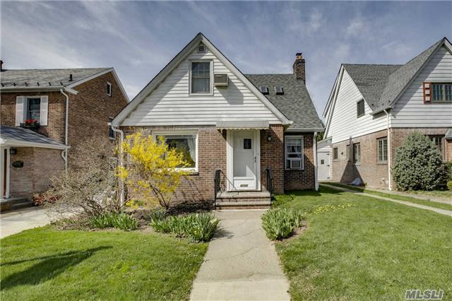 True Olde Bayside Neighborhood, Rarely Comes On Market! Brick & Frame Expanded, Cape Features, Five Bedrooms, Two Bath, Five Sky Lights - Living Room With Fireplace, Oak Floors, New Roof, Garage With Water, Electric, Everything, Great Yard, Best Block ! P.S. 203, M.S. 158