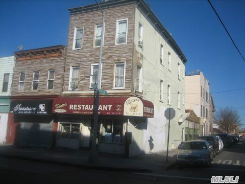 Great Investment Opportunity. Fully Leased Mixed Use Building. Hi Traffic Location. Bldg Inc. Successful Spanish Restaurant W/Basement, 2 Apartments & 4 Car Garage.