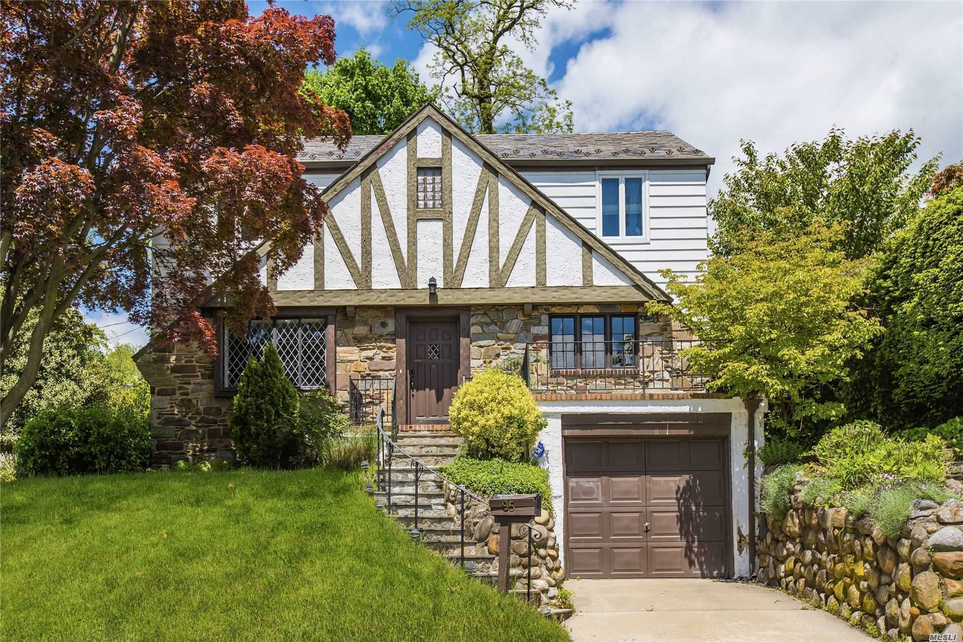 Charming English Tudor featuring living room with fireplace, formal dining room, eat-in kitchen and powder room on main floor. Upstairs offers master bedroom plus 2 additional bedrooms and full hall bath. Covered patio with builtin BBQ. Finished basement with 2 car garage. Convenient to town, Manhasset middle/high school and LIRR train station. Shelter Rock elementary. Manhasset middle/high schools.