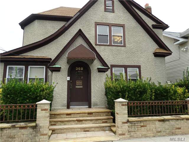 Beautiful Stucco Classic Colonial, Central Ac, Walk Up Full Stand Up Attic, Used As Office Presently. Large Property 50X91, Large Parking Area For 8 Car + 2 Car Garage+Walk Up Storage Stand Up In Garage). Taxes Will Come Down If Property Is Used Only As Residential. A Must See.