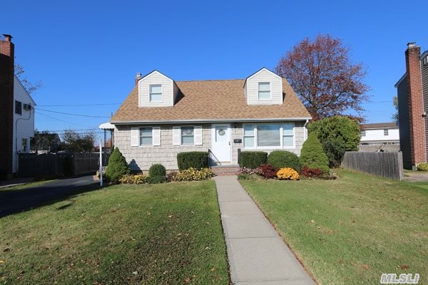 Mint Condition 2 Bedroom Cape W/Stairs To Unfinished Full Stand-Up Attic Ready For 2 Br,  Mint  Eik W/25 Cabinets,  Hardwood Floors,  New Roof,  Full Partly Finished Basement,  New Washer/Dryer,  Det 1.5 Garage With 80 Ft Driveway,  Quiet Block,  Close To All.