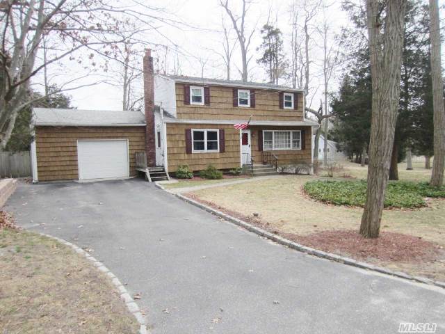 Beautiful 4Br,  2 Full Bth Colonial W/Hw Floors Throughout,  Eik W/Oak Cabinets W/Granite Countertops & Tumbled Stone Backsplash,  Custom Paint,  Custom Moldings,  French Door,  Ceiling Fans,  Some New Windows & Slider,  New Heating Sys,  New Leaders & Gutters,  Newer Roof,  1.5 Car Garage,  Large Fenced Property,  A Must See! Taxes Do Not Reflect Star