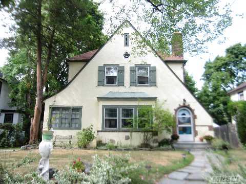 Allenwood Architectural Delight. Warm & Inviting Tudor.Spacious, Sunny & Meticulously Maintained. Hardwood Floors, Wood Burning Fireplace With Elegant Mantle, Frml Lr & Dr,Sun Room/Den Eik, Att Garage, Full Basement, Walk-Up Attic. Near Parks, Town, Lirr & Worship. Potential For Expansion