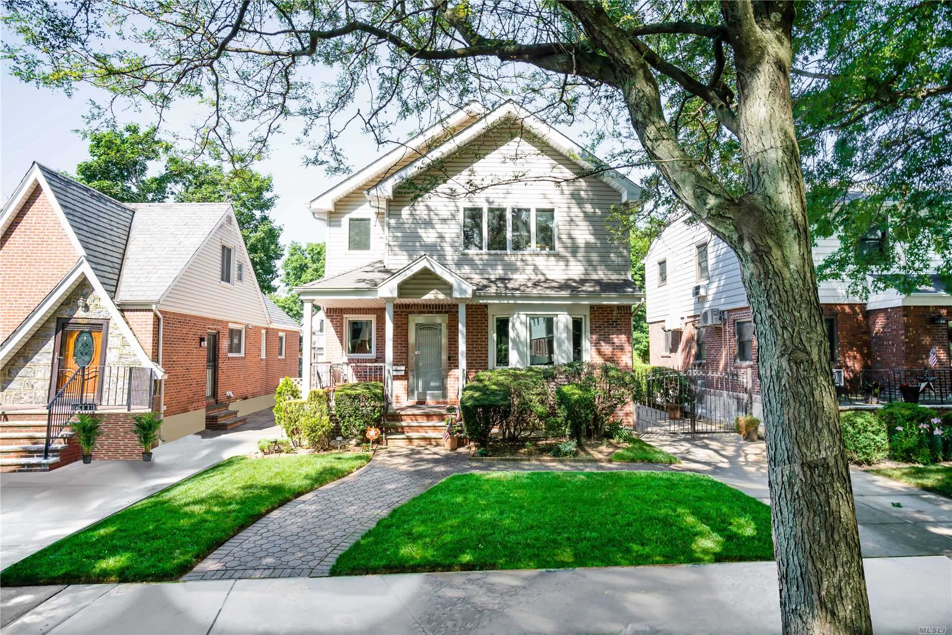 Turnkey 4/5 bedroom 3.5 bath home, domered and completely renovated in 2008 to include over 2800 sq ft. The first floor comprises of a bedroom with a full bath, open kitchen (w/ SS appliances) to dining room, into a family room that opens to a gorgeous covered deck with an adjacent patio overlooking a perfectly manicured backyard. Master En Suite w/ WIC and balcony, 2 large bedrooms and shared bath on the 2nd floor with full finished attic. Basement w/ gym, laundry, dry bar, family room & 1/2 ba