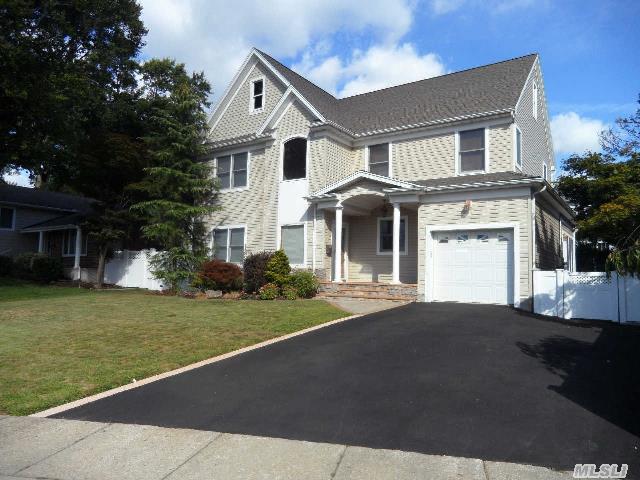 You'll Be Sorry If You Miss This...Better Than Brand-New(Work Done In Past 8 Yrs) Colonial In N.Syosset Cul-De-Sac,  Great For Entertaining W/Open Layout & 9 Ft Ceilings!  5 Brs,  3 Bths,  Large Granite Eik W/Huge Island,  Fdr,  Den W/Stone Fp & Sliders To Yd,  Sunroom, Full Fin Bsmt,  Solid Wd Doors,  Anderson Windows,  Garage,  New 2-Car Driveway,  Charming Front Porch W/Portico