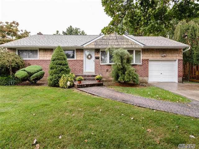 Desirable Ranch Model With Open Floor Plan, 3 Br, Bath, Large Den, Eik, Living Room, Dining Room, Deck With Sliders From Kitchen And Den And 3 Skylights. Full Basement, Central Air Condition And So Much More. Syosset Sd # 2 A Must See!