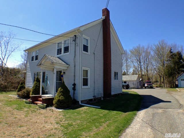 Situated Midway Between Kenny's Beach And The Hamlet Of Southold,  Is Where You Will Find This Charming 3 Bedroom Farmhouse. Featuring A Large Living Room,  Updated Kitchen And Maintenance Free Exterior,  Detached Garage And Several Sheds. Priced To Sell!