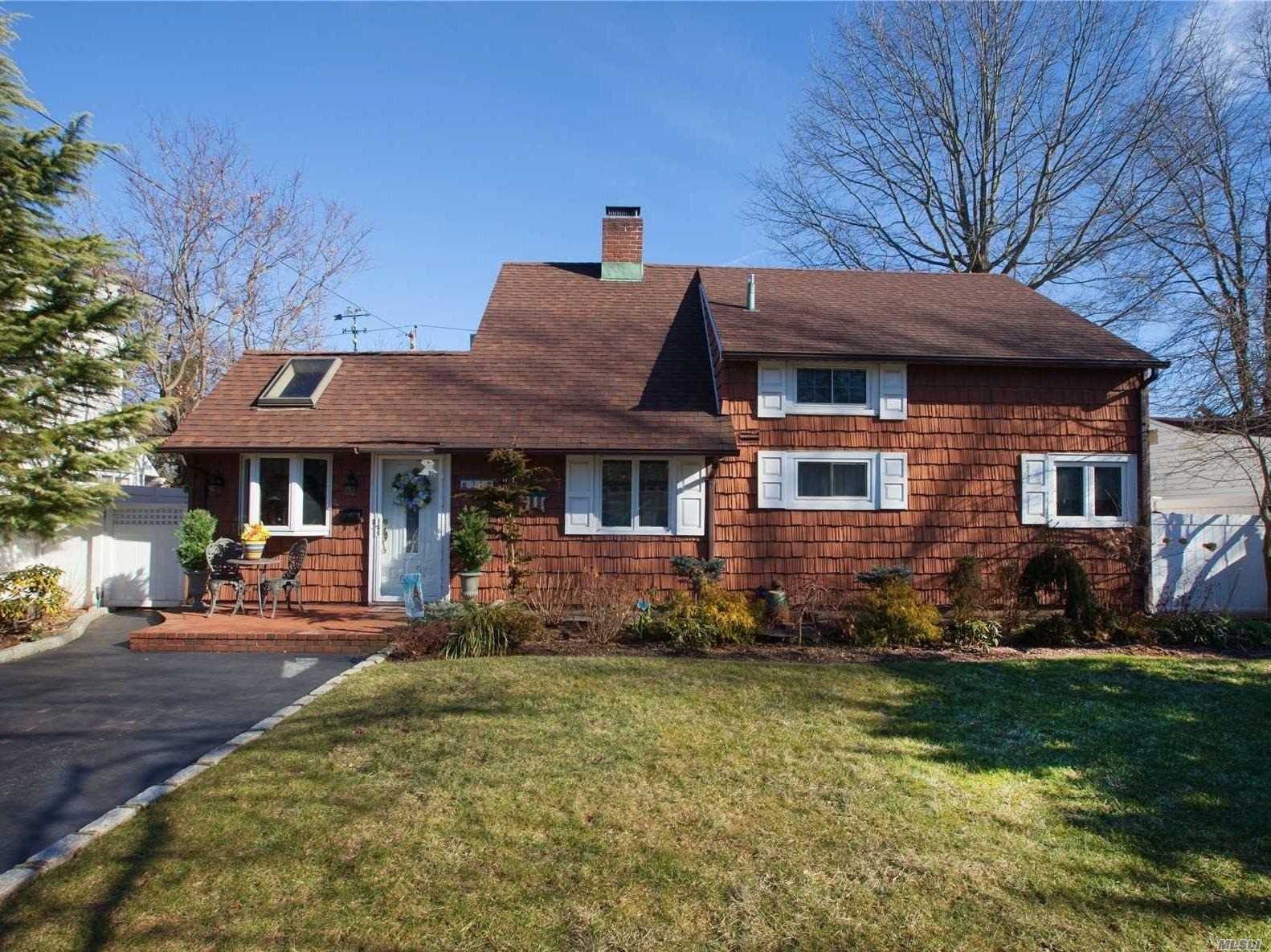 Charming Expanded Ranch With Incredibly Low Taxes $6550! This Home Features Living Room, Dining Room, Eat-In-Kitchen, Den, 4 Bedrooms And Bath. New Roof, New Siding Well Maintained Home Situated In The A Section Of Hicksville Minutes Away From Lirr, Highway And Shopping.