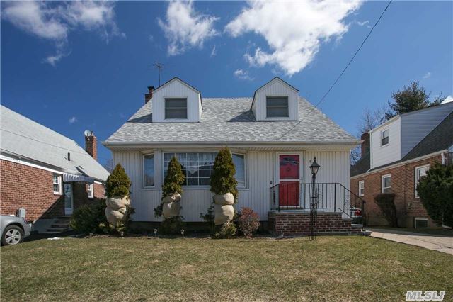 This Charming Side Hall Cape Is Located Mid Block. Boasts An Open Floor Plan With A Den Or Bedroom On The First Floor With Sliding Doors To A Wooden Deck. The Bedrooms Are All Spacious With Lots Of Closets. Full Finished Basement Is Warm And Inviting With High Ceiling And A Half Bath. Close To All Including Schools, Shopping, Lirr, Restaurants, Park And More.