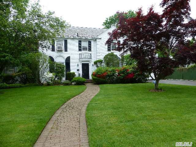 Must See This 5 Bedroom,  4 Bath Colonial. Magnificent Property On A Quiet Residential Street. Room To Expand,  Large Rooms,  Finished Basement.