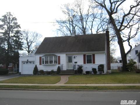 Superman Says You Won't Find Lois Lane Here..Just Clark Kent..Super Mint 4 Br..1.5 Bath Rear Dormered Cape In The Heart Of The Park On Oversized Property...Updated Boiler..Large Updated Eik W/Doors To Multi Level Deck Overlooking Gorgeous Yd..Large Fdr..New Carpet..Oil Heat & Gas Cooking..Finished Bsmt W/Sep Ose..Igs..Att Garage..Close To Everything..Taxes Are W/Out Star