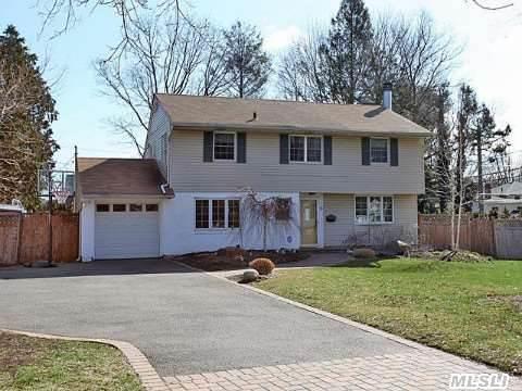 Lovely Affordable 3 Bed Room Colonial In Country Estates Kings Park. Taxes W/Star $8212. Great New Eik With Stainless Applianes, Large Family Rm W/Fireplace, Hardwood Floors. Great Neighborhood. This Home Does Not Back Up To 25A.