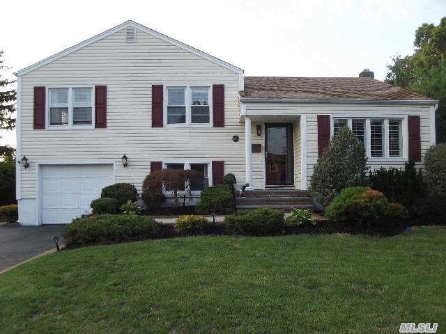 A Sun Filled Treasure Is Waiting For You! Spacious Kitchen With Vaulted Ceiling-New Cherry Cabinets-Ss Appliances-Granite Counters-3 New Bathrooms-Living Room With Gas Fireplace-Custom Window Treatments-Finished Basement With Playroom And Office-Make This Your New Home!