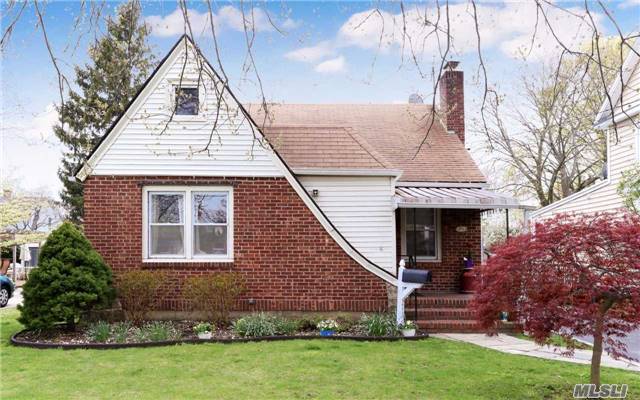 Beautiful Custom Tudor Cape Includes Refinished Hardwood Floors, Custom Oak Doors And Moldings, In Ground Sprinklers, Cac, 16X32 In Ground Pool, 200Amp Electric Service, Wood Burning Stove Insert, New Gas Heat/Hot Water Heater, A Wired Central Alarm System, Thermo Vinyl Windows And A 6 Car Driveway W/2Car Garage.Walking Distance To Lirr Winthrop, Shops, And Nice Intermodal Center.