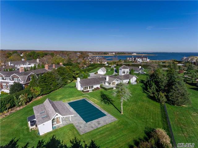 On Shinnecock Road, Quogue&rsquo;s Premier Location, Stands An Impressive Compound W/ 4 Legal Structures, (Can Never Be Duplicated Again). A 4113 Sq.Ft. Main House W/ 3 B & 4.5 Bths, A Tower Study W/ 360 Degree Views Of The Golf Course & The Bay. A Guest House W/ 1 Br & Kitchen Also Pool Cabana W/ Bth & 2 Car Garage. 20 X 45 Heated Gunite Pool. 1.73-Acres Park Like Grounds.