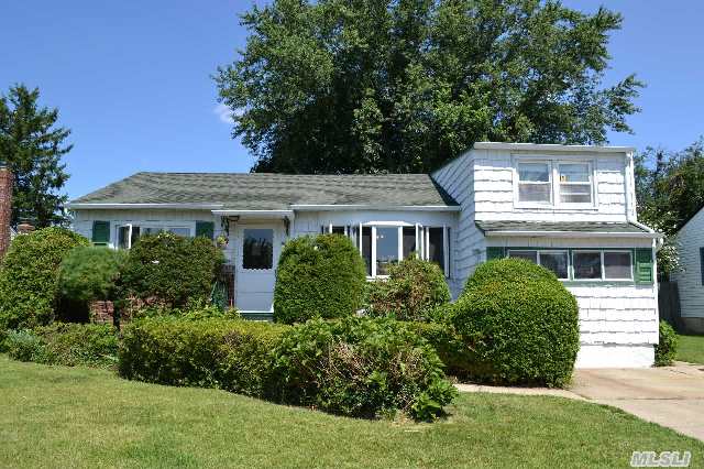 3Br,  2Ba Split Ranch In The Bethpage School District.  Features New Roof,  Gas Cooking And Updated Gas Hot Water Heater.  Sliding Glass Doors To Deck,  Patio And Fenced Backyard.  Ready For Entertaining.  Mid-Block Location.  Great Home!!