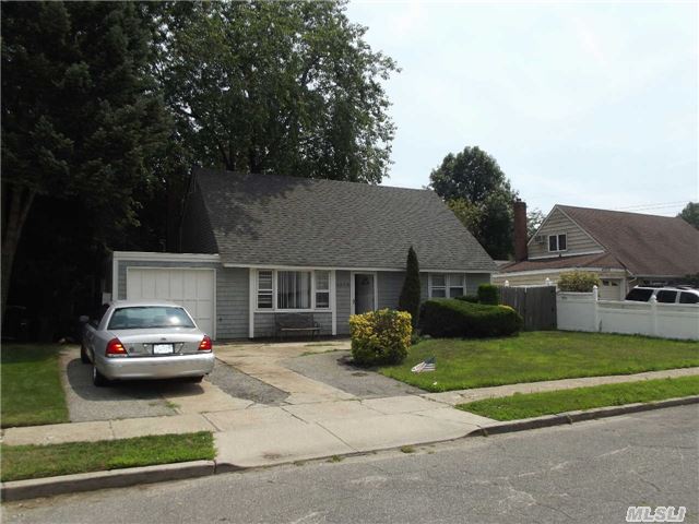 Expanded Cape-Full Rear Dormer-Possible M/D Permit Required-Main Level Garage Converted-Updated Siding Siding-Roof-Boiler-House Has Been Rented So It Needs A Bit Of Owner Occupied Attention